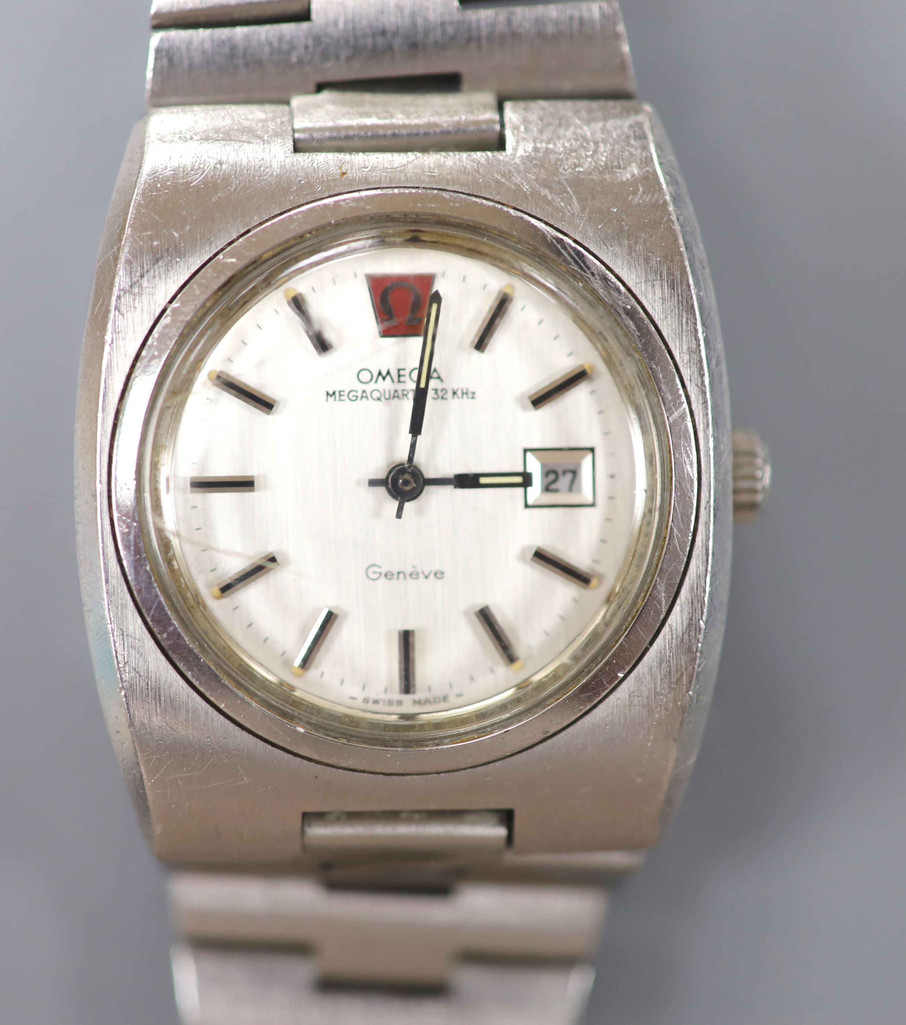 A gentleman's stainless steel Omega Megaquartz 32KHz wrist watch, on stainless steel Omega bracelet, case diameter 31mm.